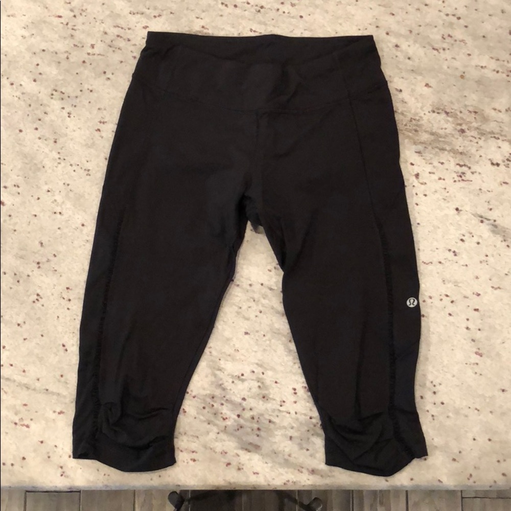 Lululemon Black Crops - ruffled stitching + pocket